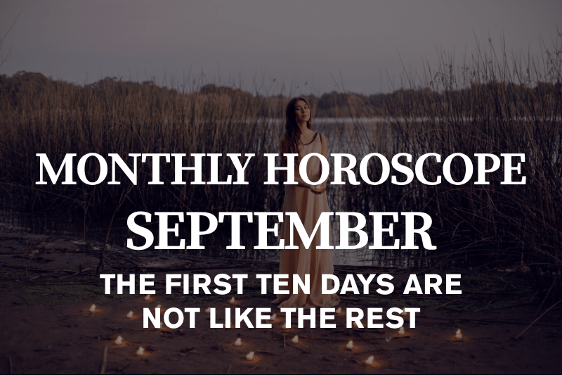 September 2026 horoscope flat lay with a handwritten planner, brass pendulum and dried wheat